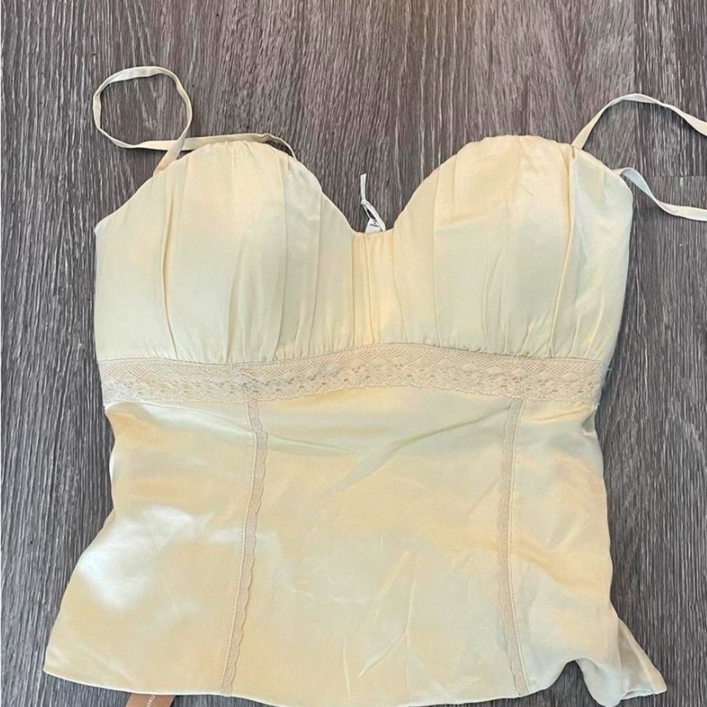 reformation kessie silk top in the color sugar